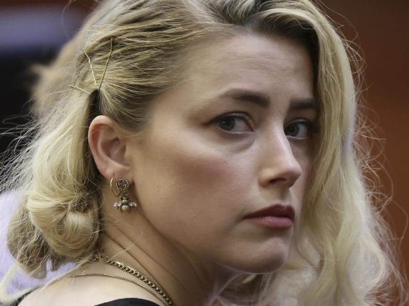 In this file photo taken on June 1, 2022 actor Amber Heard waits before the jury during the Depp v. Heard civil defamation trial at the Fairfax County Circuit Courthouse in Fairfax, Virginia.
