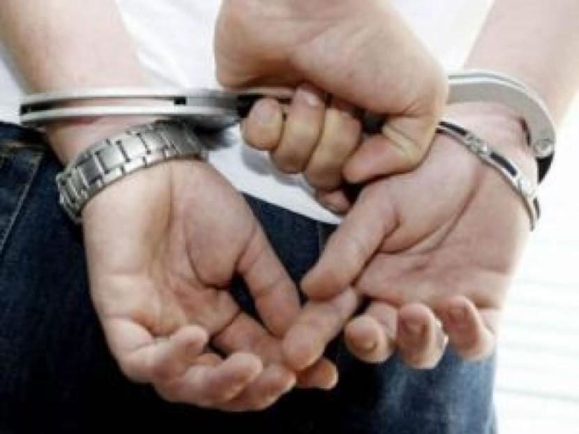 Muhammad Shauqil Muhammad Shawal, 19, Muhammad Shahrin Sazali, 22, Muhammad Qamarul Ardy Mohamed Hassim, 20, and Joreemy Abdullah, 23, arrested for loanshark activities to earn a quick buck. Photo: Reuters file photo