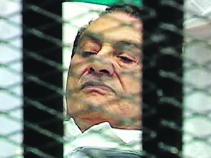 Hosni Mubarak, who is on life support, in the courtroom for his trial last year. Photo: Reuters