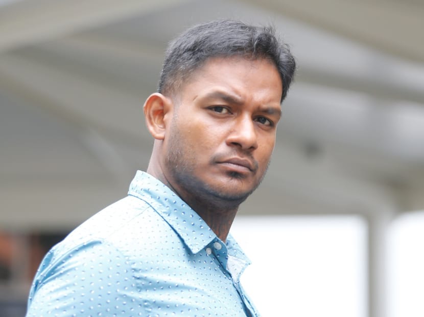 Standing in the middle of a road and disrupting the flow of traffic, Ganesh Valas Supa Maniam was repeatedly warned by police officers to move on. Instead of taking heed, the 32-year-old allegedly hurled verbal abuse at them and lashed out physically. Photo: Najeer Yusof/TODAY
