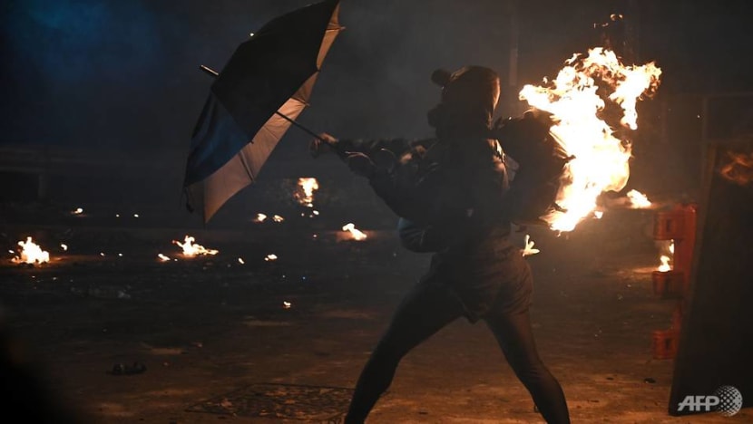 Hong Kong clashes rage on university campus and business district Hong Kong clashes rage on university campus and business district