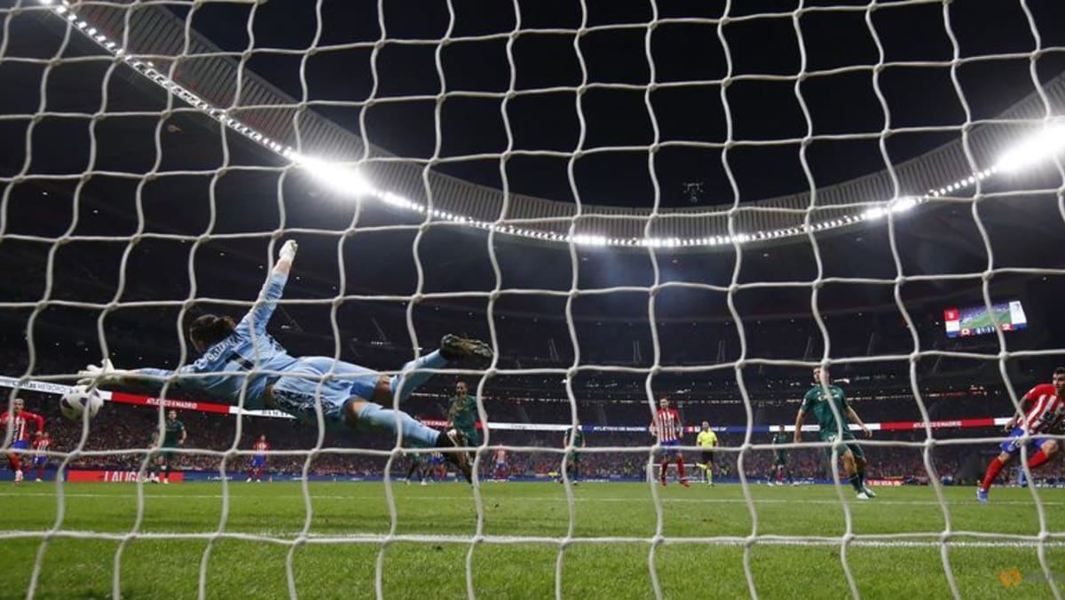 Atletico fight back to beat Cadiz 3-2 with Correa double