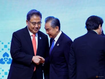 FILE PHOTO: Chinese Foreign Minister Wang Yi and South Korean Foreign Minister Park Jin interacts at the ASEAN Plus Three Foreign Ministers’ Meeting in Phnom Penh, Cambodia August 4, 2022. REUTERS/Soe Zeya Tun