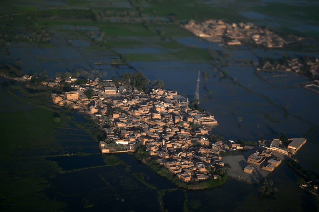 This aerial photograph shows a flooded area on the outskirts of Sukkur, Sindh province, on Sept 9, 2022. 