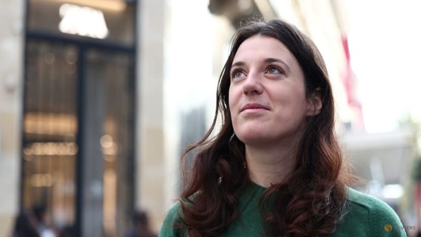 Green activist hid in Louvre loos before gatecrashing Louis Vuitton's show