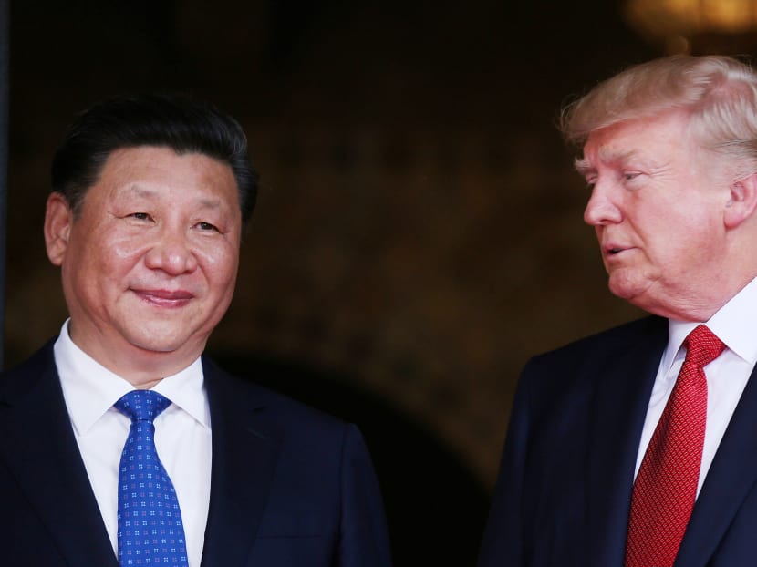 U.S. President Donald Trump welcomes Chinese President Xi Jinping at Mar-a-Lago state in Palm Beach, Florida, U.S., April 6, 2017.  Photo: Reuters