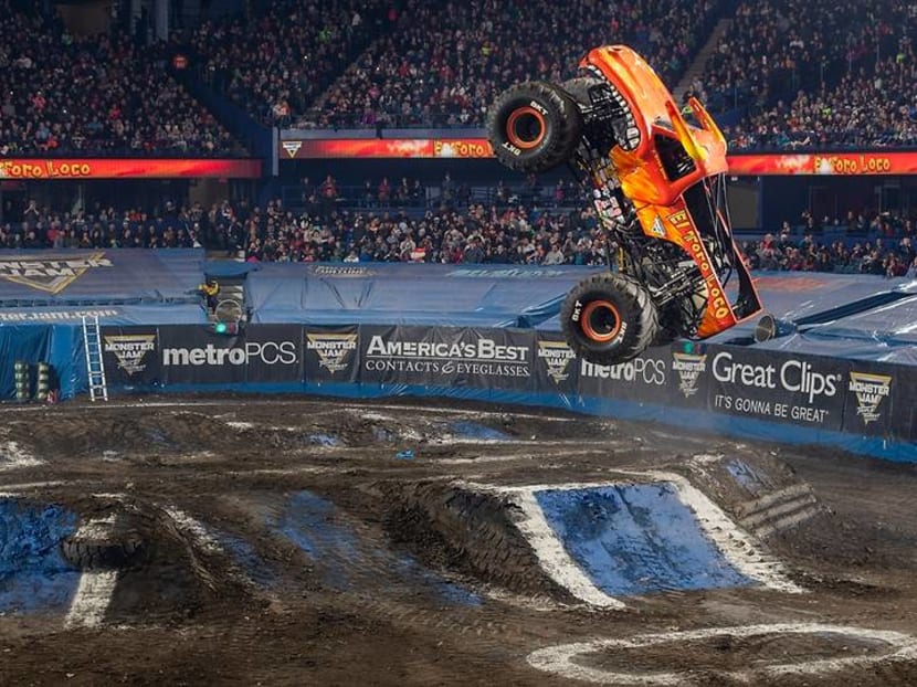 Watch massive trucks perform death-defying airborne stunts at Monster Jam