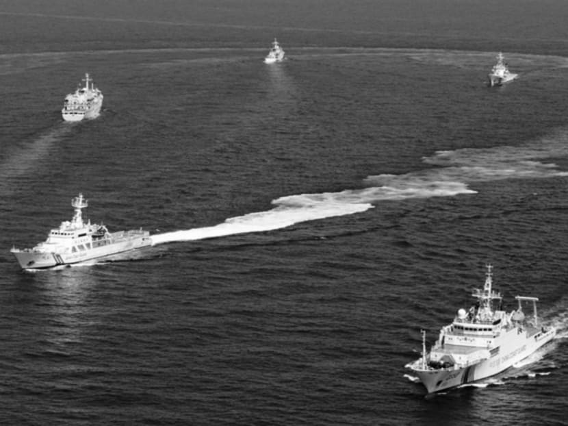China Maritime Surveillance and the Japan Coast Guard vessels near the Senkaku Islands in the East China Sea in 2013. After Japan nationalised the islands in 2012, defence exchanges between the two countries were suspended entirely. Photo: Reuters