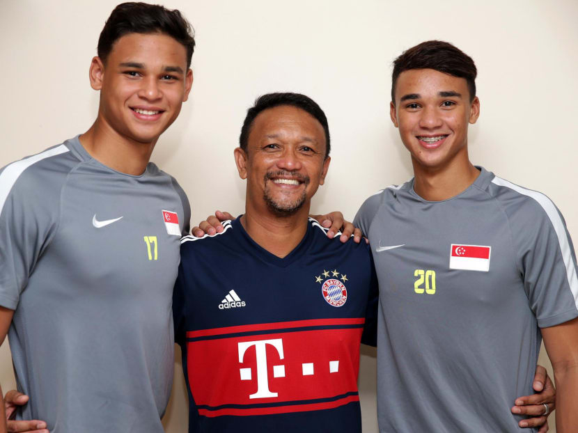 Football icon Fandi Ahmad flanked by his sons, Irfan (left) and Ikhsan. Photo: Wee Teck Hian/TODAY