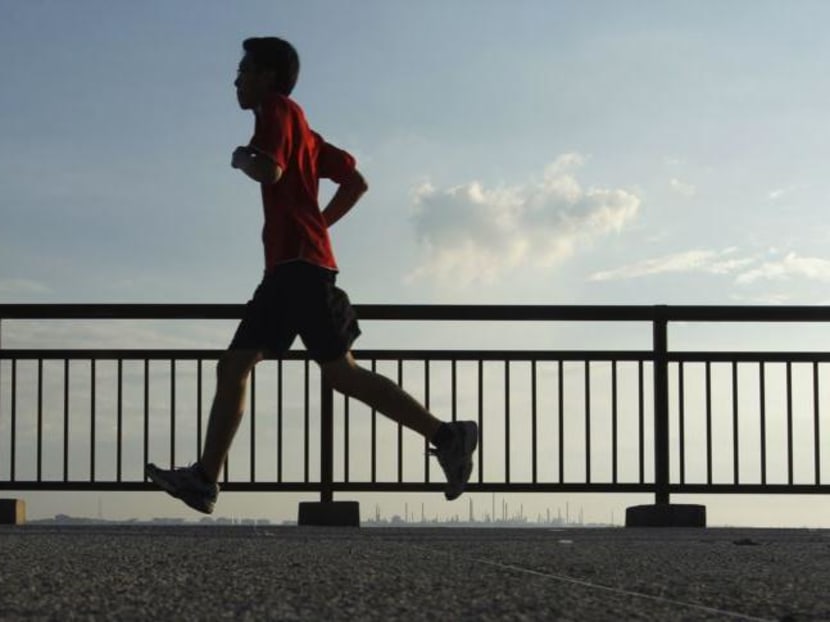 A man jogs at Labrador Park in Singapore on Aug 29, 2013. Photo: Reuters