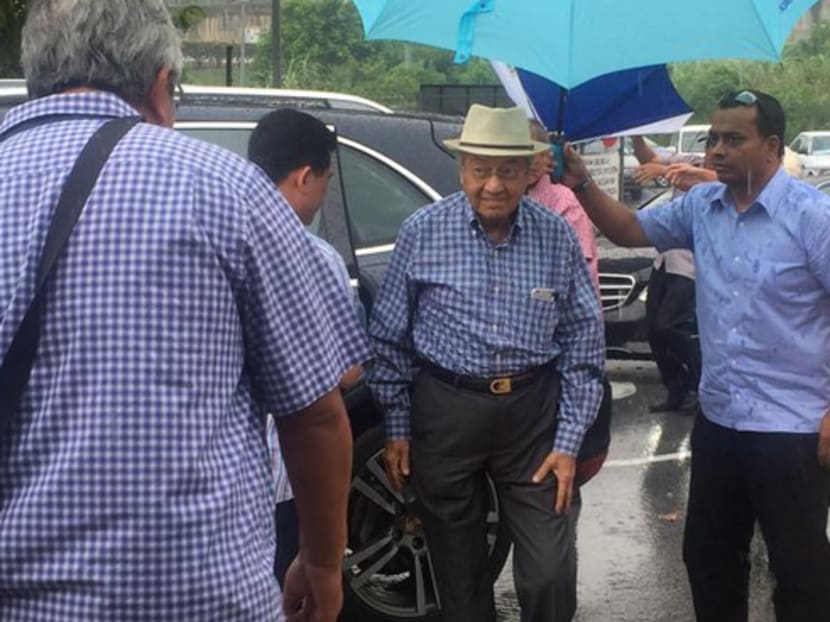 Dr Mahathir Mohamad arriving at a train station in Kuala Lumpur to greet protestors at #Bersih4 rally late this afternoon (Aug 30). Photo: Melissa Goh/Channel NewsAsia