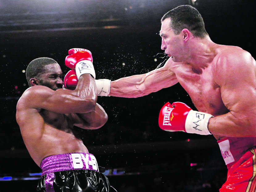 Klitschko (right) was in control from the outset as he outclassed Jennings during their bout at Madison Square Garden in New York on Saturday. PHOTO: AP