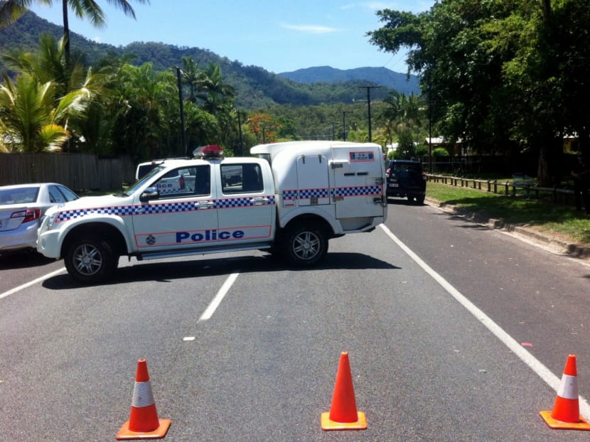 Police block a road in Manoora, a Cairns suburb. Photo: AAP