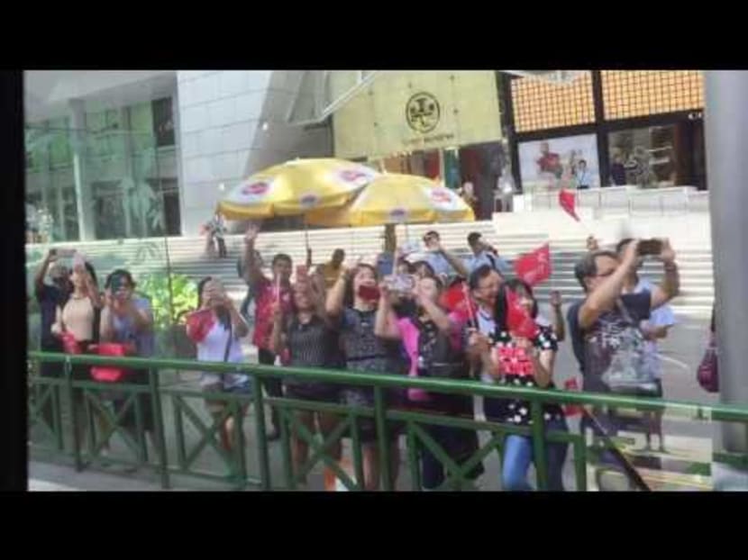 Schooling's victory parade: The crowd outside ION Orchard