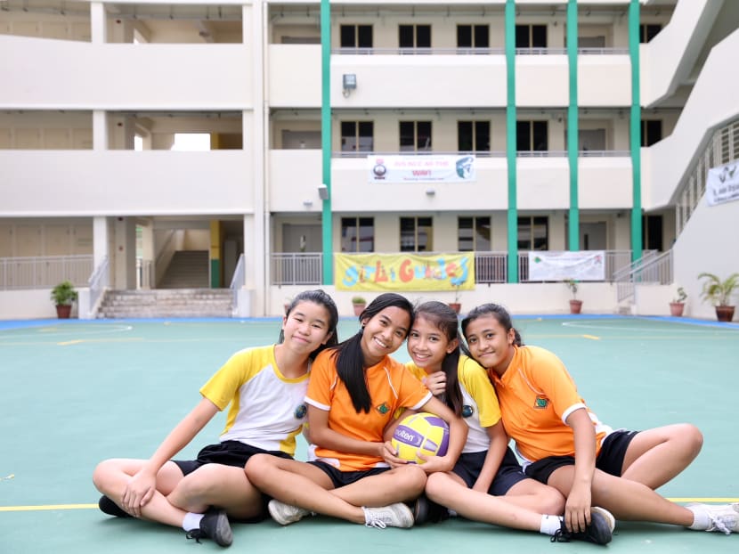 Despite being fierce rivals in the sporting arena, Hong Kah Secondary and Jurongville Secondary, for example, have combined their netball and basketball teams to compete in the upcoming West Zone Inter-Schools competition. Photo: Koh Mui Fong/TODAY