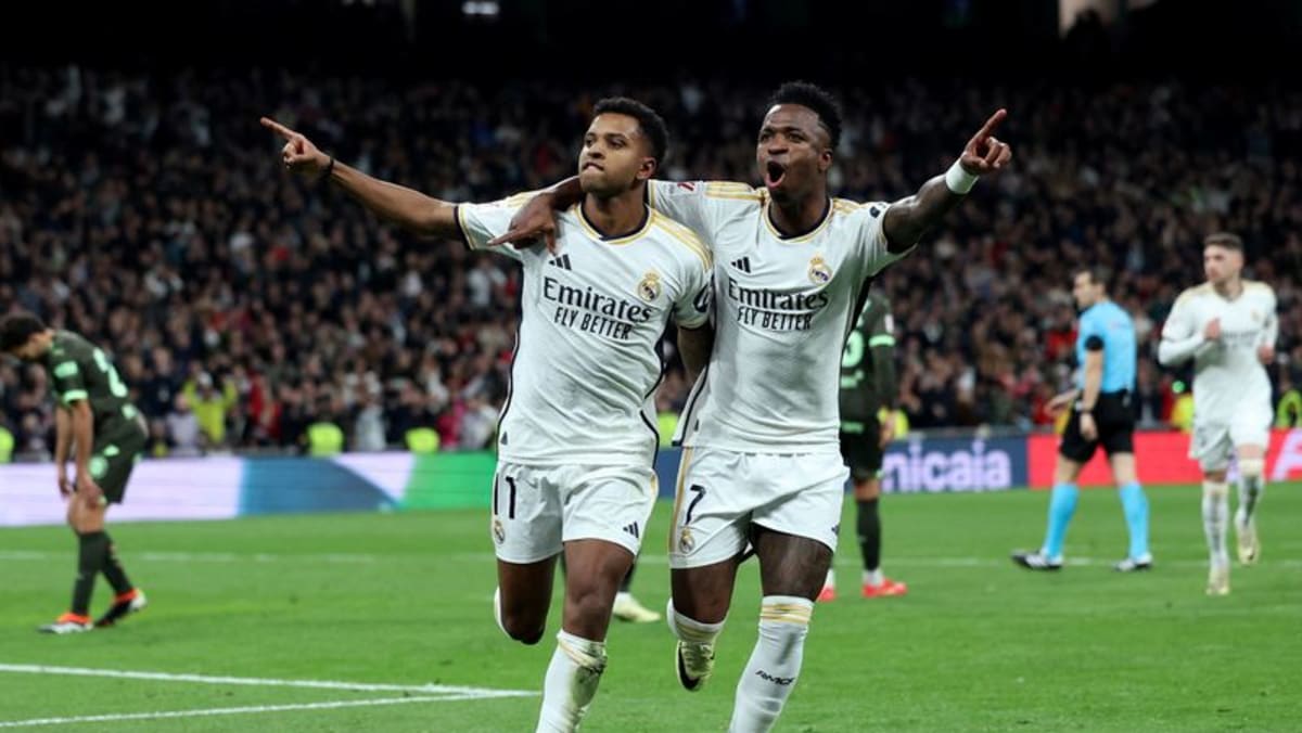 Bellingham brace helps leaders Madrid crush title rivals Girona