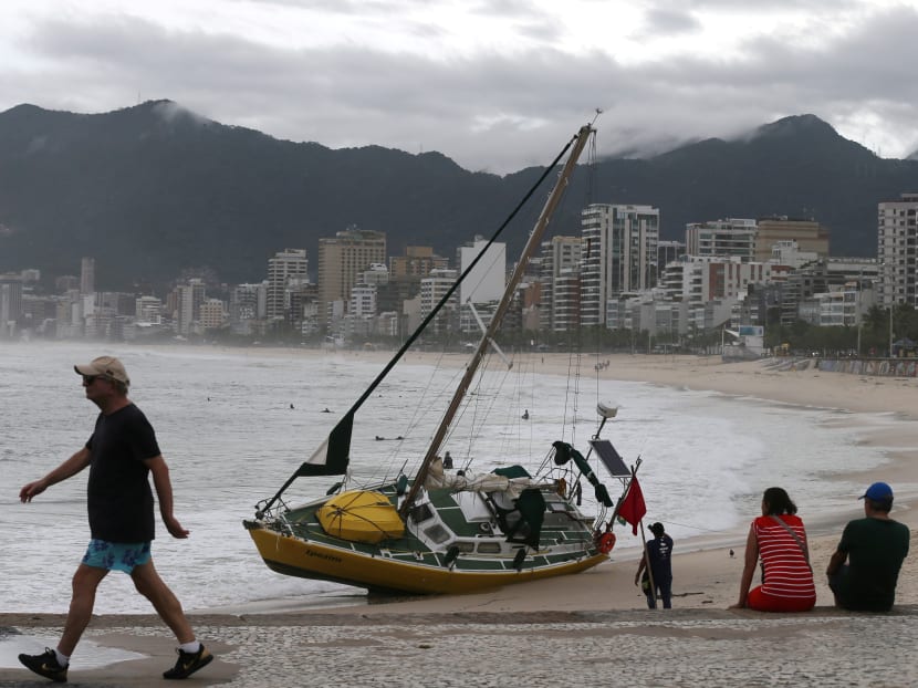 Photo of the day: A beached sailboat is seen on Arpoador beach after heavy rains in Rio de Janeiro, Brazil on Thursday, Feb 7, 2019.