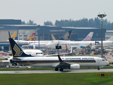 File photo of a Singapore Airlines plane along the tarmac of Changi International Airport on May 13, 2022.