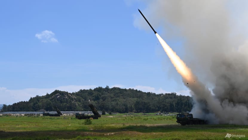 Taiwan slams 'evil neighbour' China after missiles fly over island