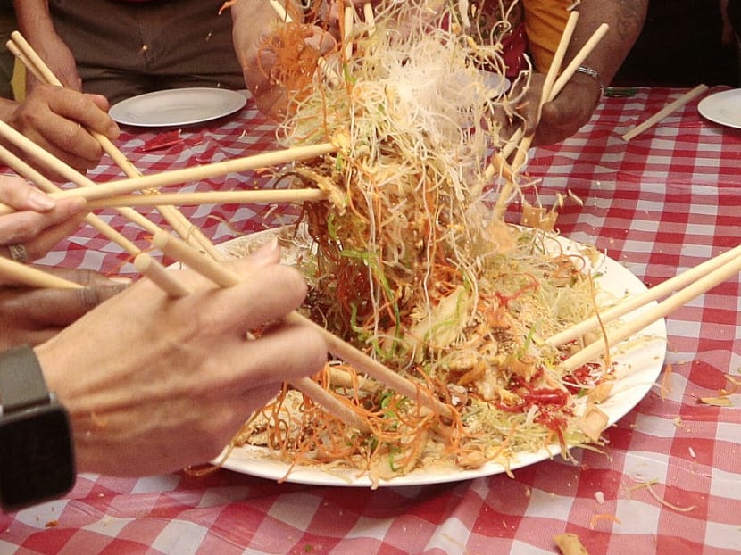 The Government’s Covid-19 task force stated that diners must wear a mask during the tossing of yusheng or raw fish salad (pictured), which should be done without any verbalisation of the usual auspicious phrases.