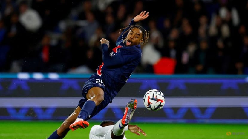 PSG beat Strasbourg 4-2 to claim top spot