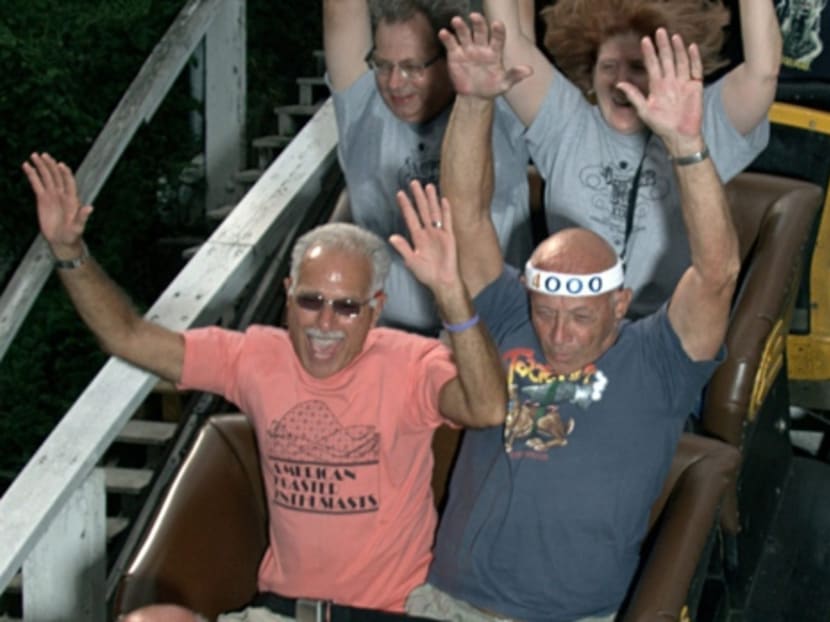 Mr Vic Kleman (in the headband) takes his 4,000th ride on Kennywood's Jack Rabbit roller coaster, in West Mifflin, Pennsylvania, on Aug 15, 2010. Photo: AP