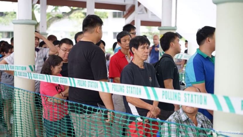 Laporan Bergambar: Pusat mengundi dibuka bagi Pilihan Raya Kecil Bukit Batok