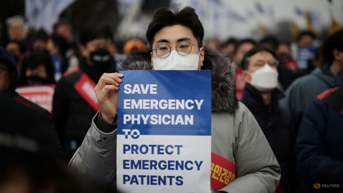 South Korean police question first doctor over walkouts
