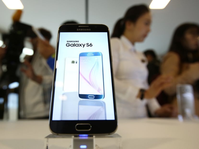Samsung unveiled the payment service in March as part of its new high-end Galaxy S6 smartphone range. Photo: Bloomberg