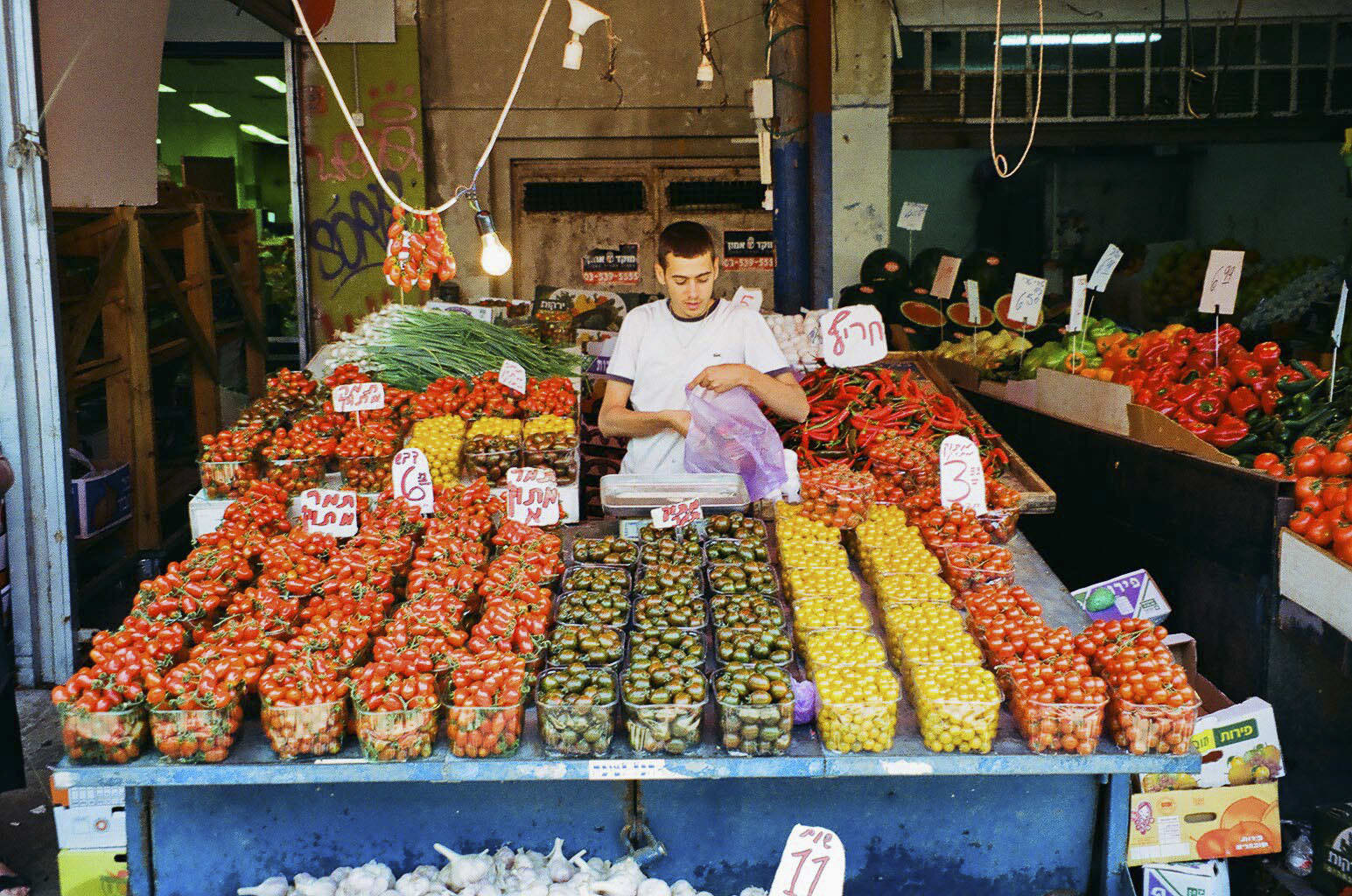 In an image provided by Eager Tourist, a produce market in Tel Aviv. From Mexico to Greece, plant-centric hotels, restaurants and tours are proliferating. 