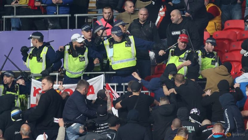 Hungary fans banned from Poland qualifier after Wembley clashes Hungary fans banned from Poland qualifier after Wembley clashes