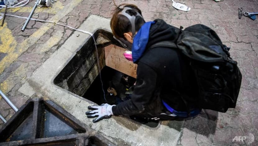 Desperate Hong Kong protesters explore sewers in campus escape bid Desperate Hong Kong protesters explore sewers in campus escape bid