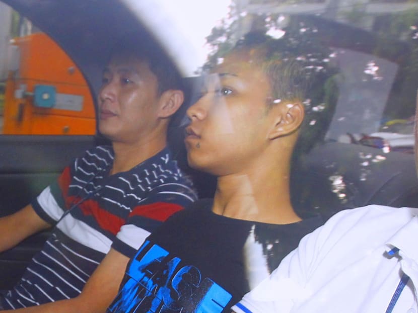 The 22-year-old man charged in court over the murder of an elderly woman in Teck Whye found dead on April 12, 2014. Photo: Ernest Chua