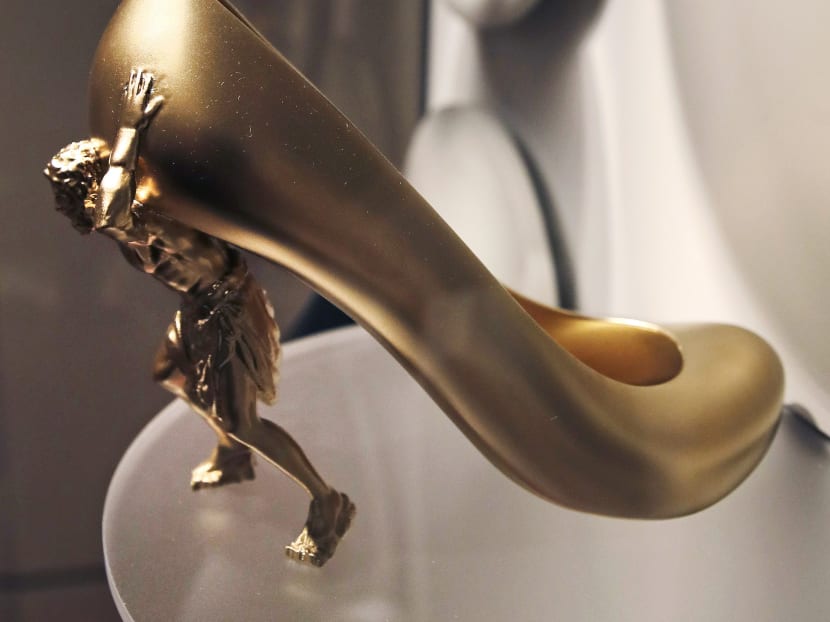 From flats to stilettos: Exhibit explores what shoes reveal
