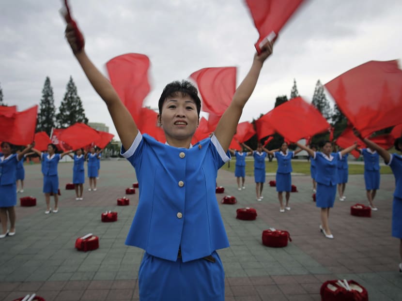 Pyongyang starts the day early, with patriotic music