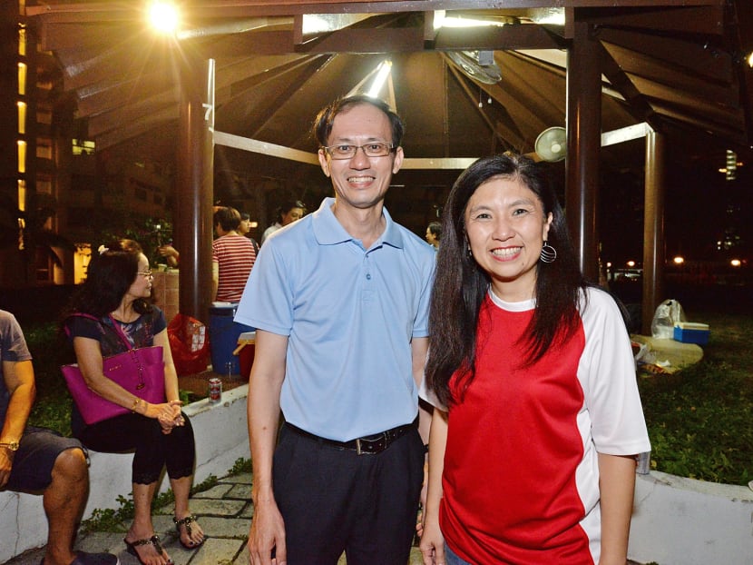 The Workers’ Party’s webmaster Yee Jenn Jong, a Non-Constituency Member of Parliament, with Singapore People’s Party member Jeannette Chong-Aruldoss at a barbecue at Mandarin Gardens condominium in Marine Parade last night. Photo: Robin Choo