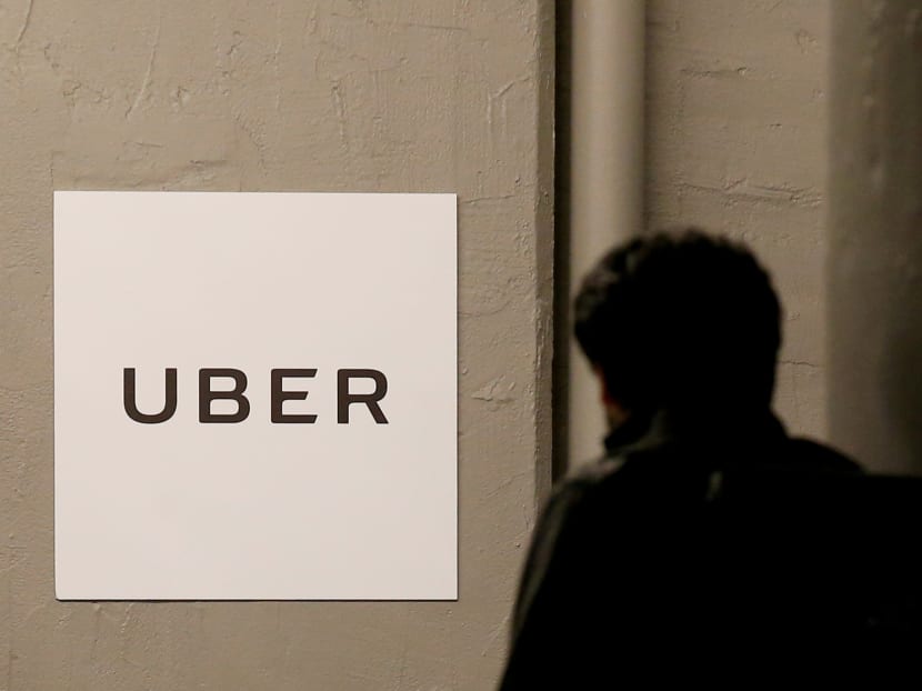 A man arrives at the Uber offices in Queens, New York, on February 2, 2017.  Photo: Reuters
