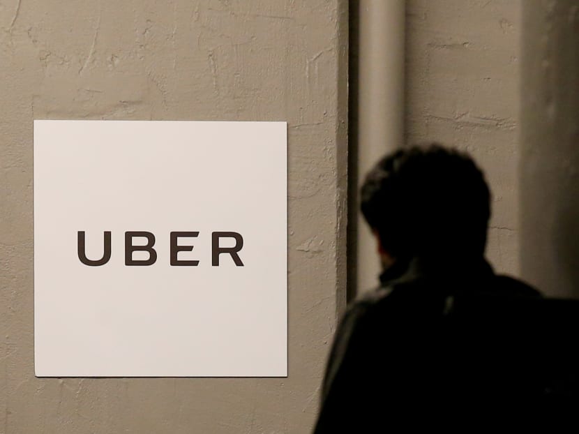 A man arrives at the Uber offices in Queens, New York, on February 2, 2017. Photo: Reuters A man arrives at the Uber offices in Queens, New York, on February 2, 2017. Photo: Reuters