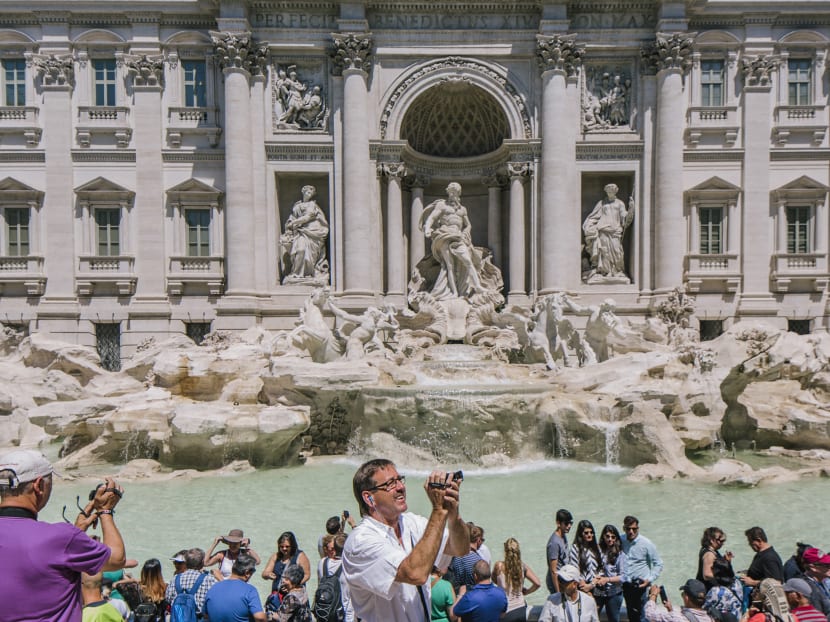 Tourists at the Trevi Fountain in Rome on June 20, 2017. Photo: The New York Times