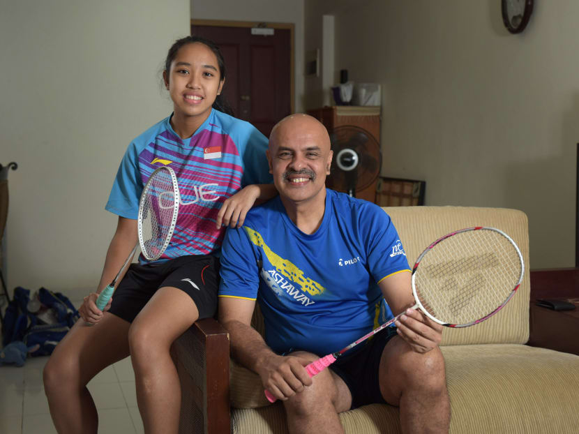 Former national badminton player Hamid Khan and his daughter, national shuttler Nur Insyirah Khan at home. Photo: Nuria Ling/TODAY