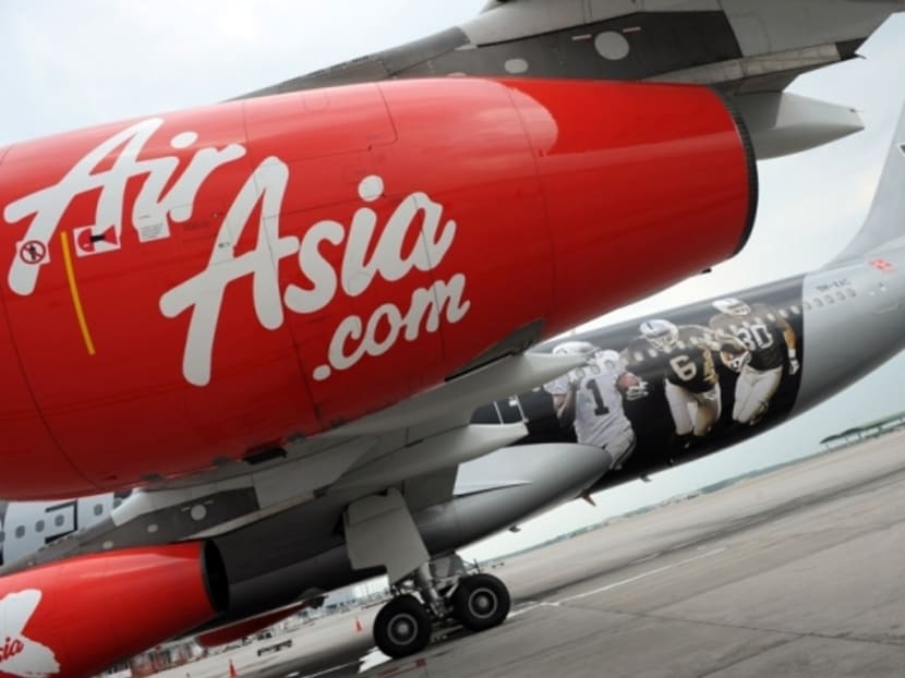 An AirAsia plane came within 152 metres of a Jetstar flight that was about to land, causing alarms to sound in both planes' cockpits. Photo: AFP