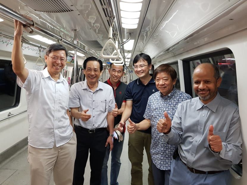 Incoming SMRT chief Neo Kian Hong (far left) joined Transport Minister Khaw Boon Wan (second from right), SMRT chairman Seah Moon Ming (second from left), and team members from LTA and SMRT on the East-West Line's full-day signalling trial on Sunday, April 29.