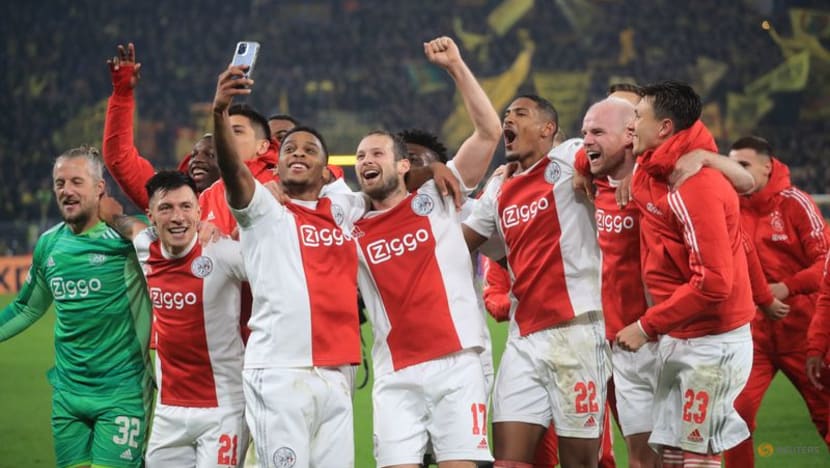 Ajax win at Dortmund to qualify for last 16 Ajax win at Dortmund to qualify for last 16