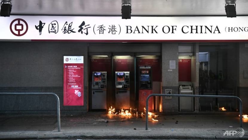 Mainland banks, pro-Beijing businesses caught in Hong Kong protest cross-hairs Mainland banks, pro-Beijing businesses caught in Hong Kong protest cross-hairs