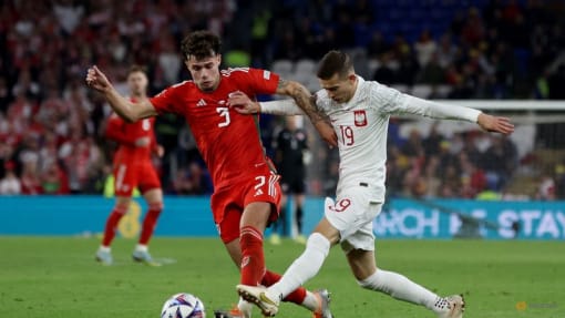 Poland beat feisty Wales to stay in Nations League top tier