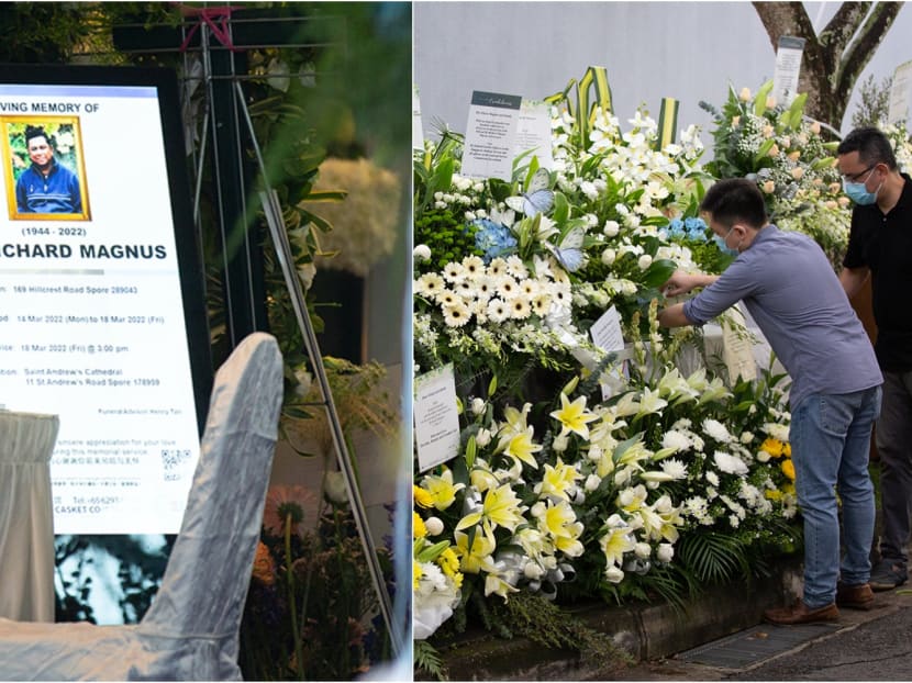 Wreaths and a poster of the funeral wake details are displayed outside the home of the late Richard Magnus on Hillcrest Road. 