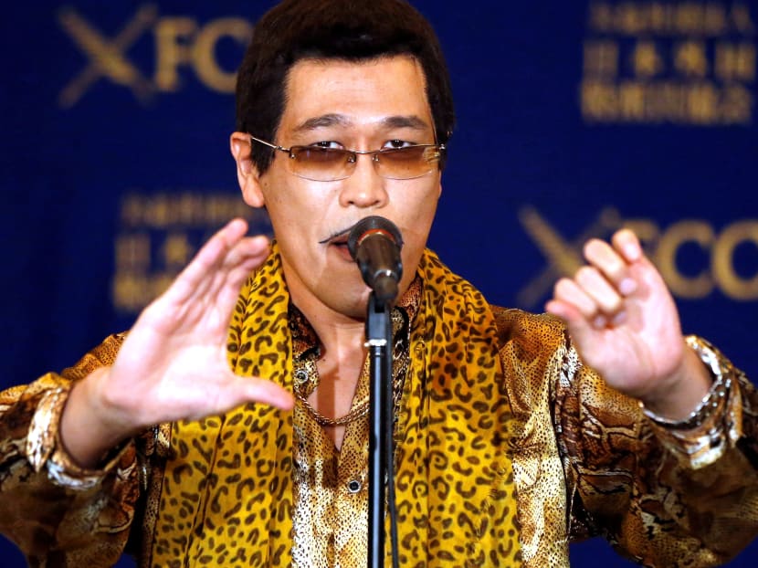 Japanese singer and song writer Pikotaro, also known by his comedian name Kosaka Daimaou or his real name Kazuhito Kosaka, who is a current Youtube star with his song PPAP (short for Pen-Pineapple-Apple-Pen), performs before media at a news conference at at the Foreign Correspondents' Club of Japan in Toky on Friday (Oct 28). Photo: Reuters