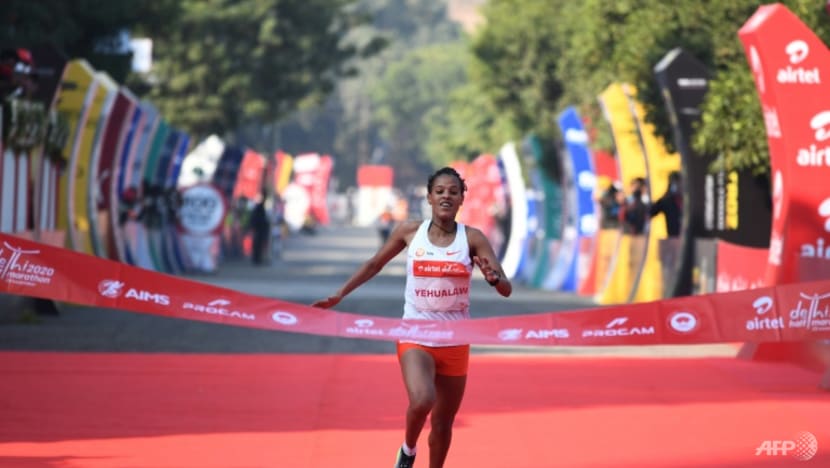 Athletics: Ethiopia's Yehualaw smashes half marathon world record Athletics: Ethiopia's Yehualaw smashes half marathon world record
