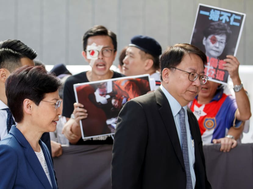 Photo of the day: Hong Kong's Chief Executive Carrie Lam meets petitioners outside her office on Aug 13, 2019.