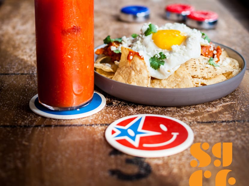 Festive-goers can feast on Crackerjack's recovery brunch Naughty, which comes with Chilaquiles, a Mexican tortilla dish, and a mezcal bloody mary. Photo: Crackerjack